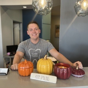 Dentist with decorative fall pumpkin candles