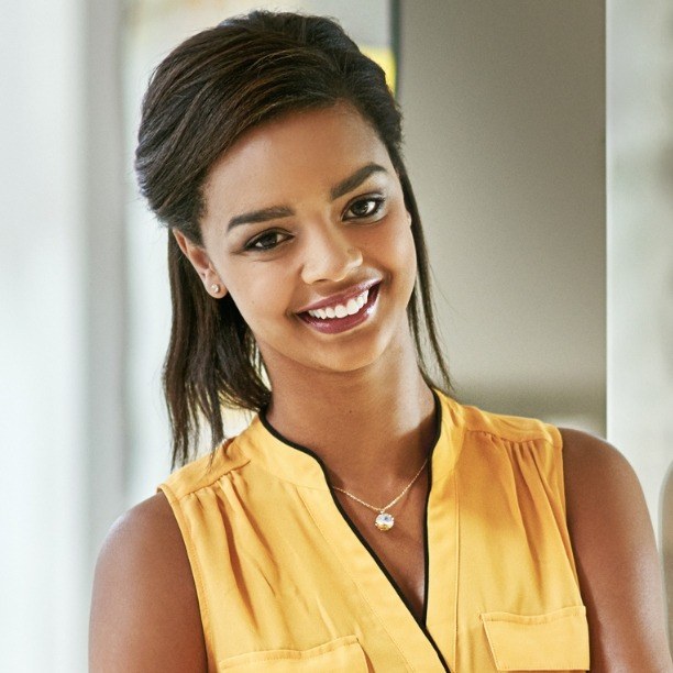 Woman smiling after six month dental hygiene visit