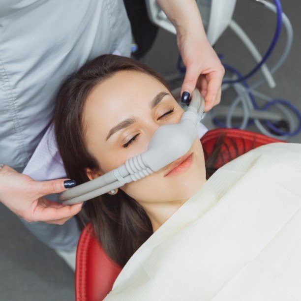 Dental patient receiving sedation dentistry treatment