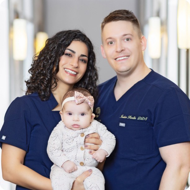 Plano dentist Doctor Hardin with his wife and baby