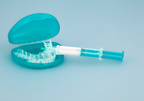 Over the counter whitening may cost less than professional whitening