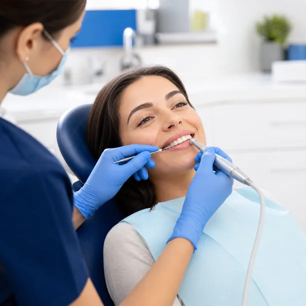 Woman receiving professional dental cleaning
